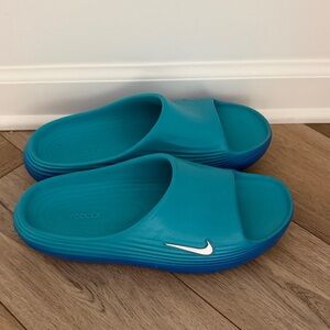 Nike Aqua Blue Slide Sandals with White Swoosh